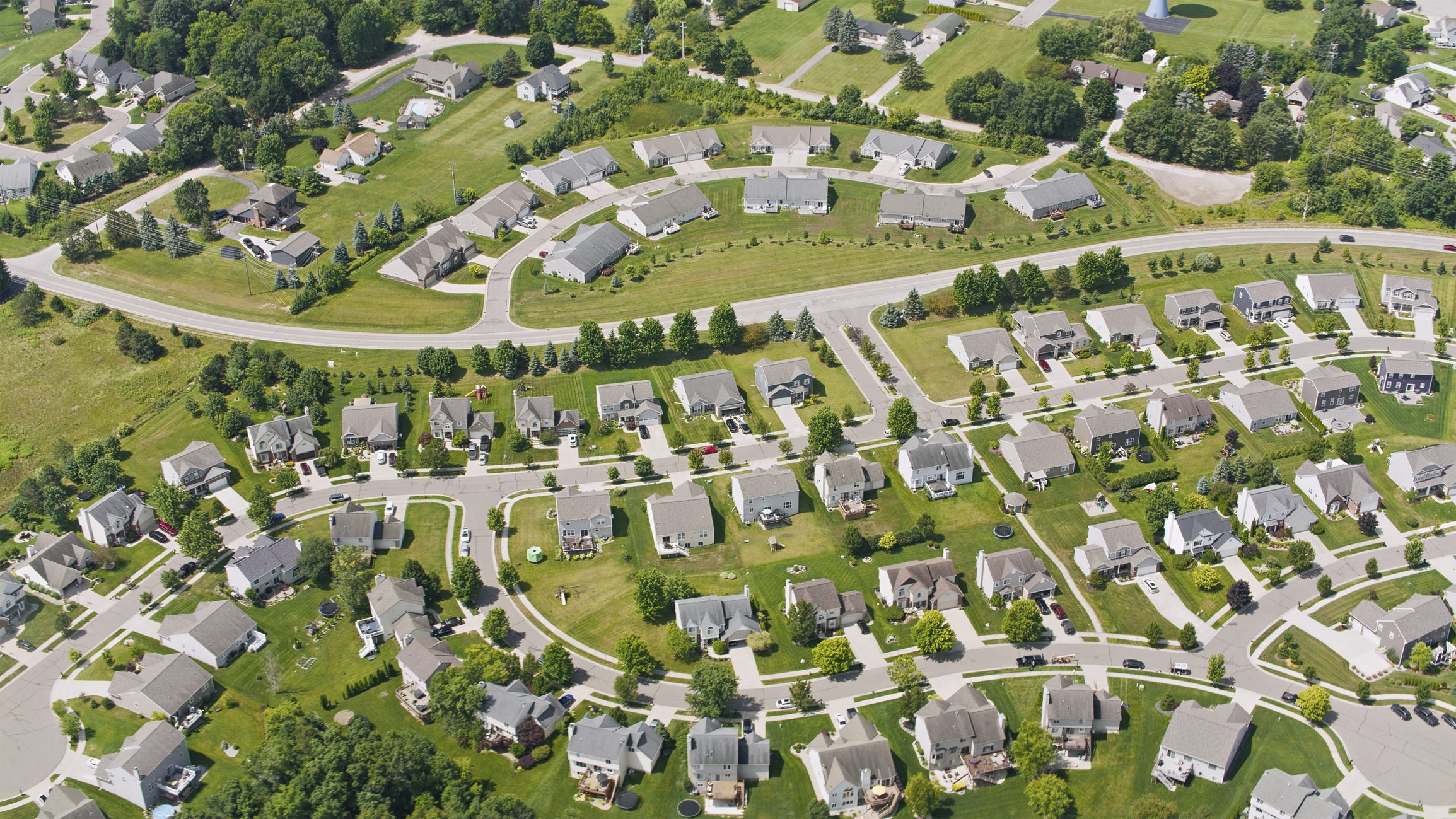 Aerial view of suburban neighborhood with houses