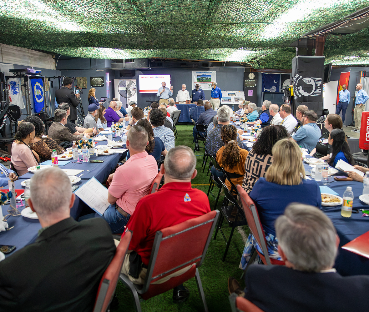 Audience listening at indoor event