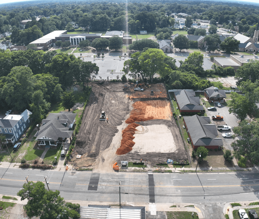 Building site surrounded by trees